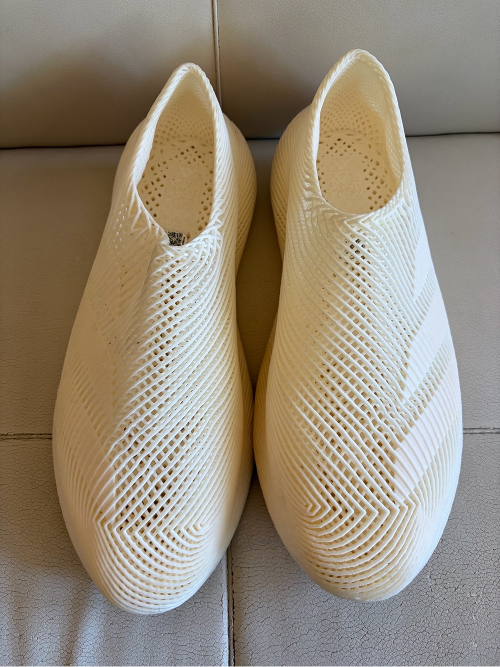 adidas Slip-On Knit Sneakers in Cream